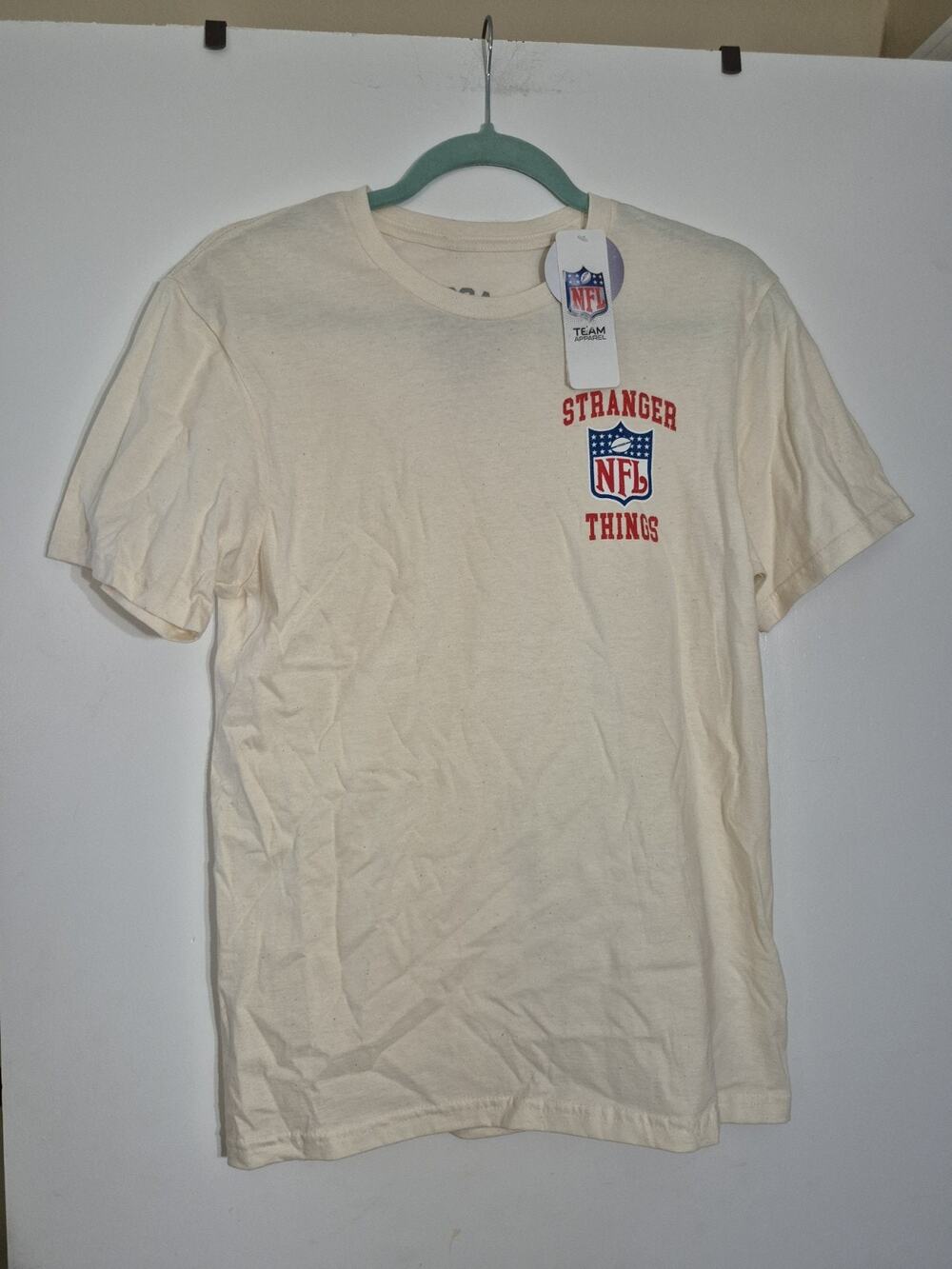 💥 NFL X STRANGER THINGS Cream T-Shirt Football #11 NWT Small D6
